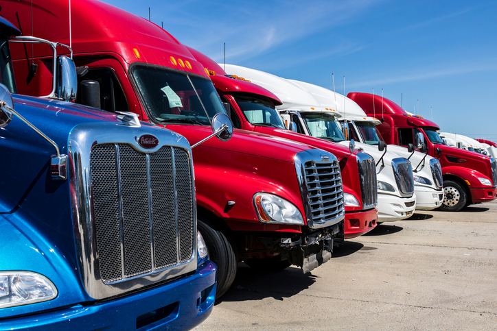 A carrier fleet lined up on the yard